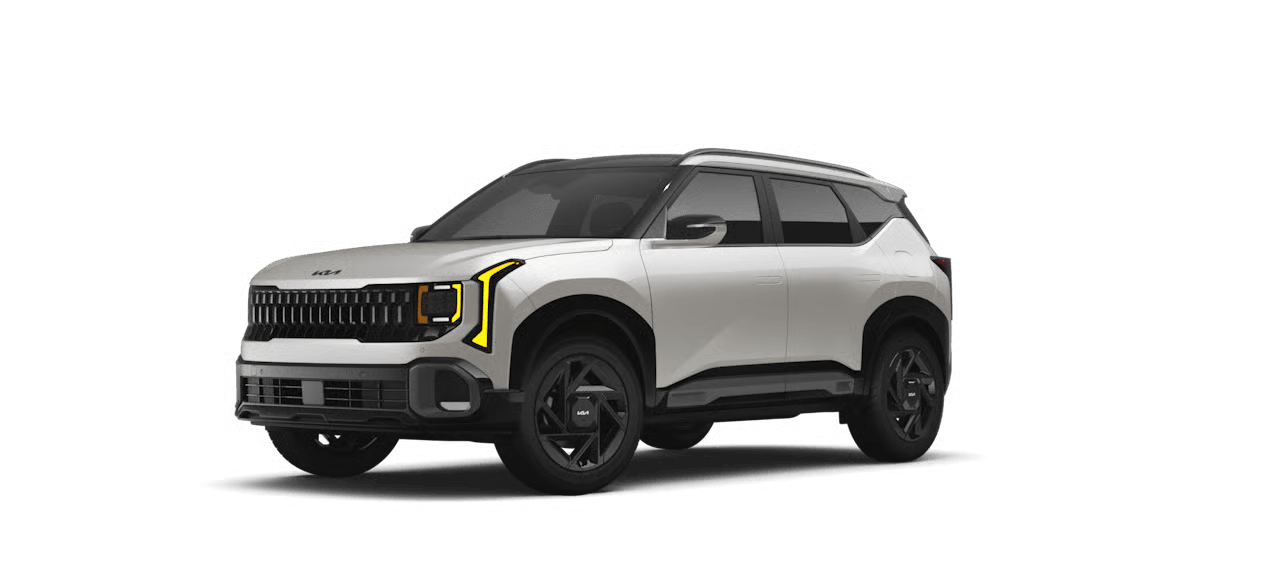 White 2027 Kia Seltos shown from the front three-quarter angle