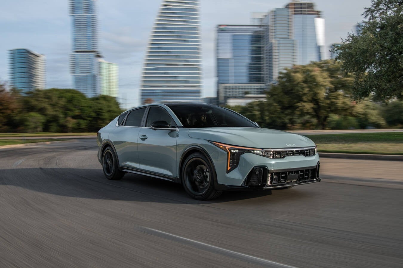 2026 and 2027 Kia K4 in a modern city setting