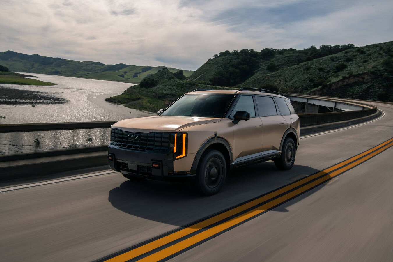 Front of 2027 Kia Telluride near a river