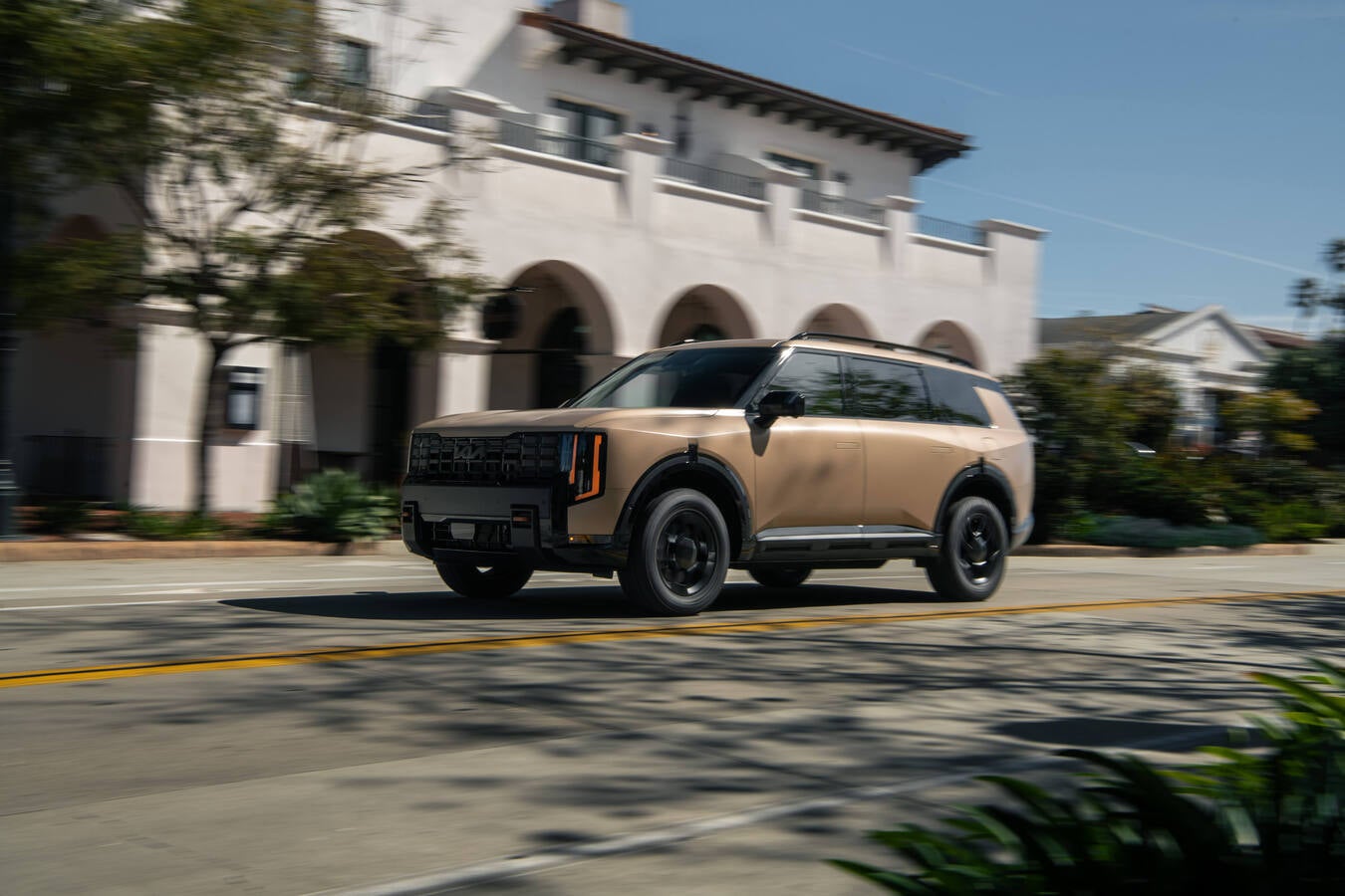 2027 Kia Telluride parked in front of a modern home