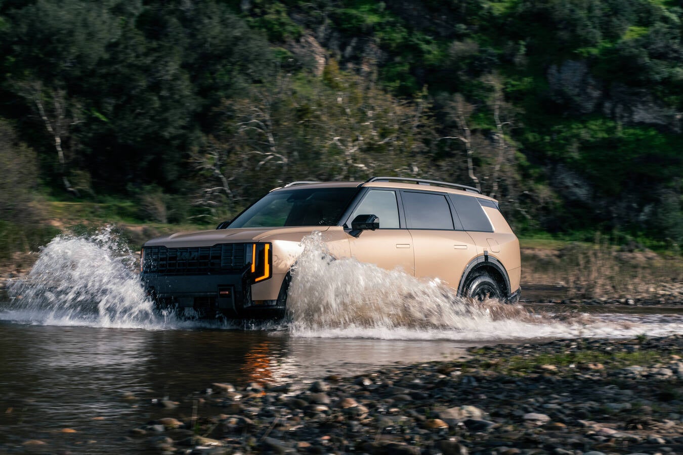 2027 Kia Telluride driving through shallow water